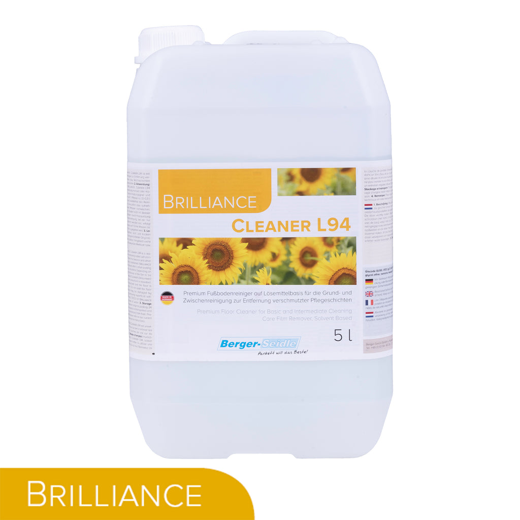 Ein 5-Liter-Kunststoffbehälter von Brilliance Cleaner L94 von Berger-Seidle, mit einem Etikett mit Sonnenblumen und Text in mehreren Sprachen. Der Behälter hat einen weißen Deckel und einen gelben Akzent mit "BRILLIANCE" am Boden.