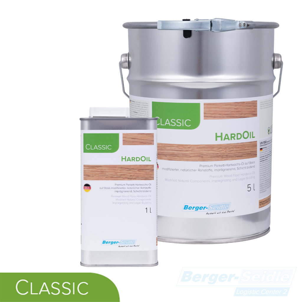 Abgebildet sind zwei Metallbehälter von Berger-Seidle Classic HardOil wood finish: ein großer 5-Liter-Kanister mit Griff und eine kleinere 1-Liter-Flasche. Beide haben weiße Etiketten mit grünen Akzenten und Holzmaserungsgrafiken.